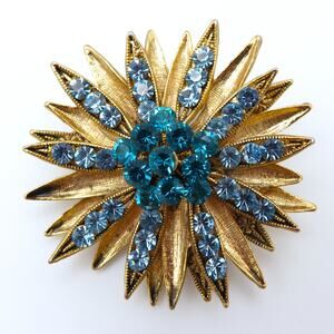 Vintage Blue Rhinestone Starburst Brooch Gold Tone 2 Inch Mid Century Pin